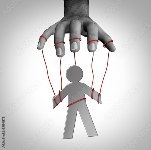 Manipulator concept and puppet master symbol as a person on strings controlled or manipulates and is gaslighting for exploitation or domination as psychological abuse photo