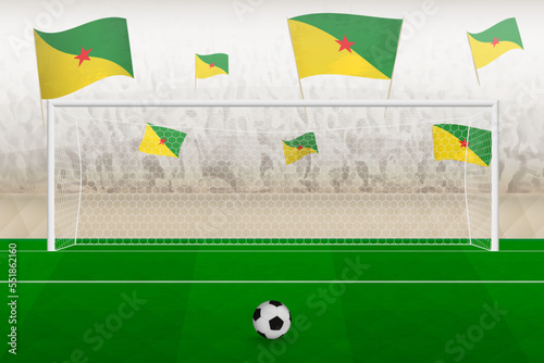 French Guiana football team fans with flags of French Guiana cheering on stadium, penalty kick concept in a soccer match.