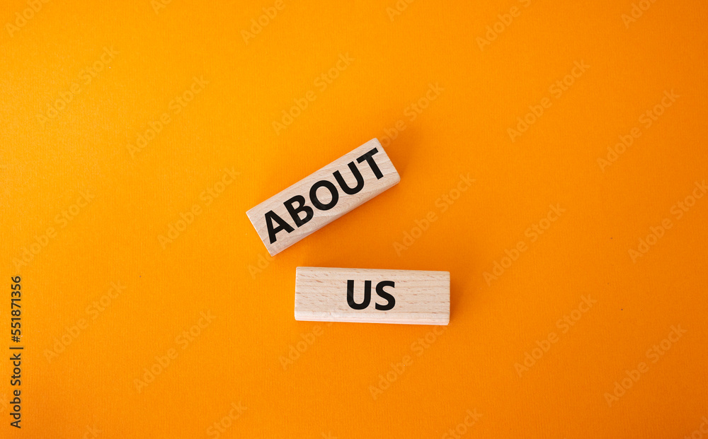 About us symbol. Wooden blocks with words About us. Beautiful orange background. Business and About us concept. Copy space. About us symbol. Wooden blocks with words About us. Beautiful orange background. Business and About us concept. Copy space.