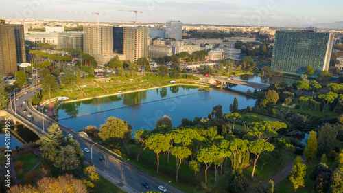 Aerial view of the modern EUR district in Rome, built for the Universal Exposition that should have been held in the Capital in 1942. In the foreground the small lake and the neighborhood par. 