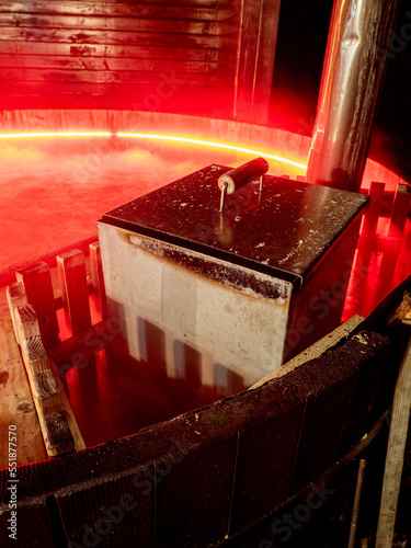 water boiling in a wooden hot tub photo