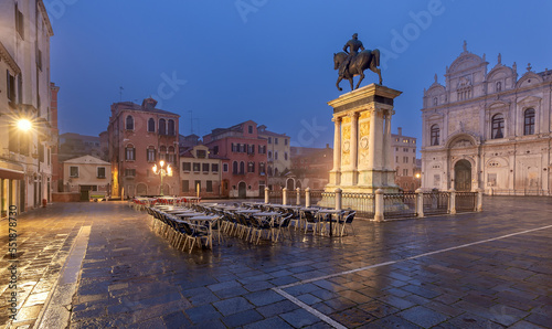 Traditional Venetian houses along the canal at sunrise.