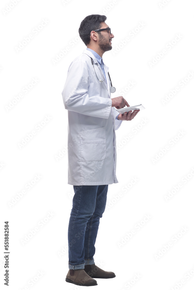 male doctor using a digital tablet. isolated on a white background. male doctor using a digital tablet. isolated on a white background.