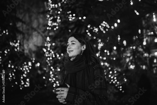 Happy woman at the Christmas market at night © ln_a