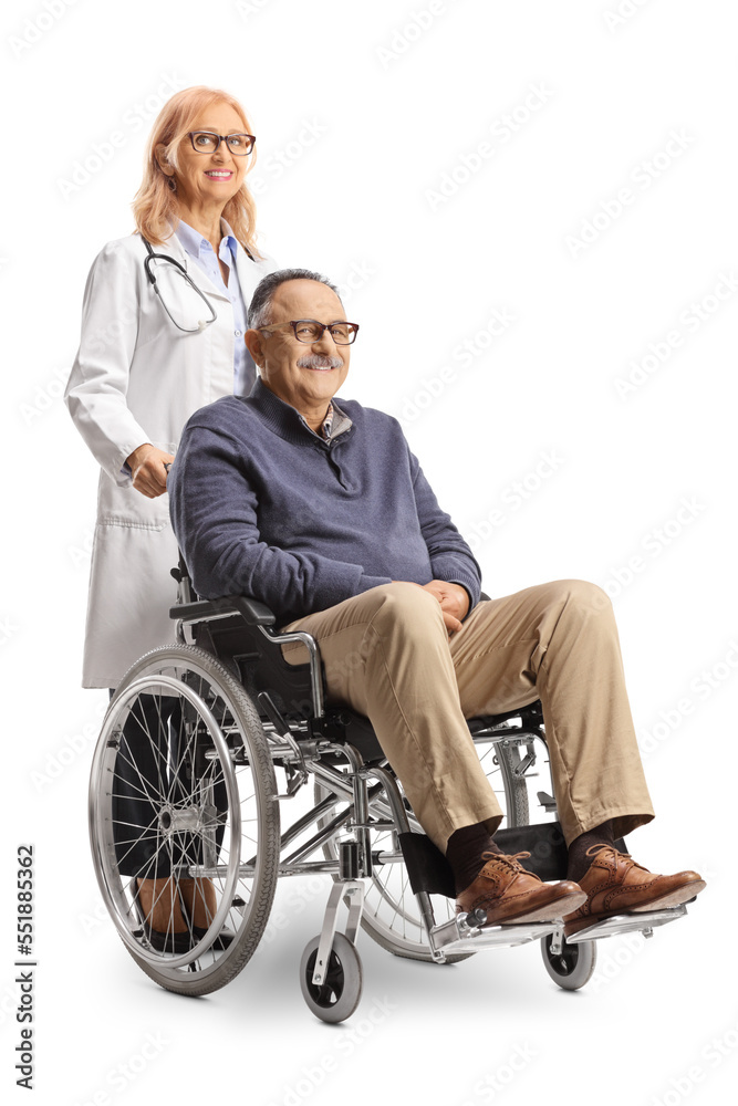 Female doctor standing behind a wheelchair with a mature male patient Female doctor standing behind a wheelchair with a mature male patient