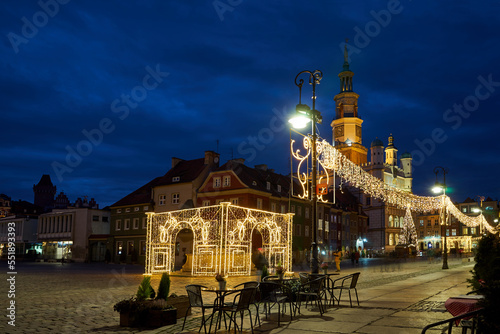 the facade of Renaissance town hall and christmas decorations in city of Poznan, monochrome 