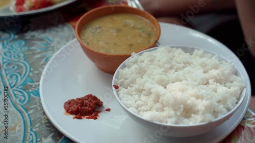 Indian traditional food, rice with vegetable soup, close-up