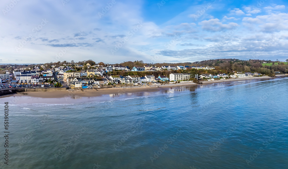 An aerial view along the coastline of the village of Saundersfoot, Wales in winter