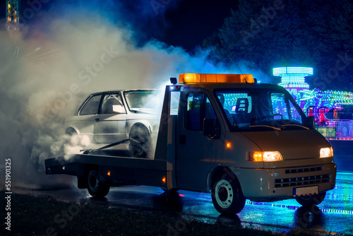 burning tires on recovery truck at night