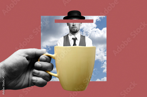 Fotografie Digital collage with male hand holding yellow cup with a bearded man in hat insi