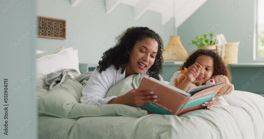 Mother and daughter reading book on a bed in a family home while happy, excited and talking about fantasy story in bedroom. Black woman and girl child together for storytelling, learning and bonding Mother and daughter reading book on a bed in a family home while happy, excited and talking about fantasy story in bedroom. Black woman and girl child together for storytelling, learning and bonding