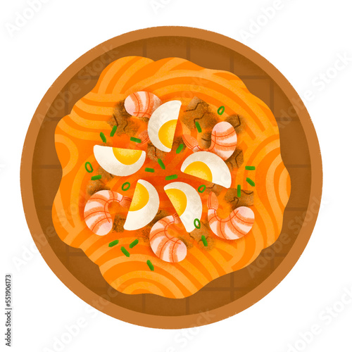 Filipino pansit malabon noodles with shrimp, ground pork, and egg on woven plate, top view