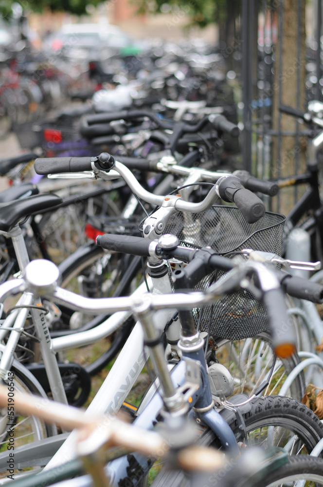 Bikes parked on the sidewalk in Copenhagen Bikes parked on the sidewalk in Copenhagen