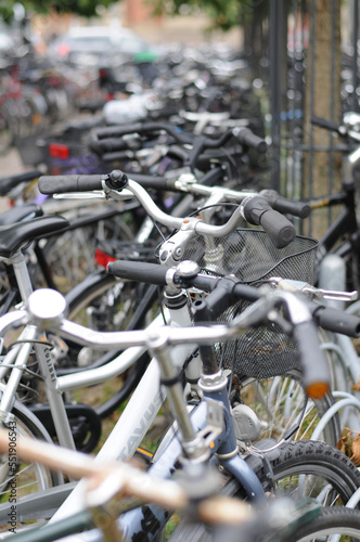 Bikes parked on the sidewalk in Copenhagen