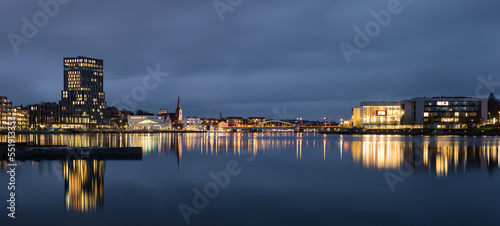 Evening cityscape of Sonderborg (Dan. Sønderborg), city in Southern Denmark. Night skyline city lights wide panorama 