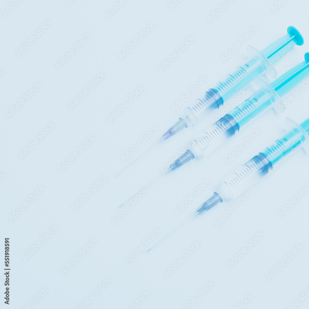 Medical syringe on a white background. A syringe for injection. The concept of health and beauty Medical syringe on a white background. A syringe for injection. The concept of health and beauty