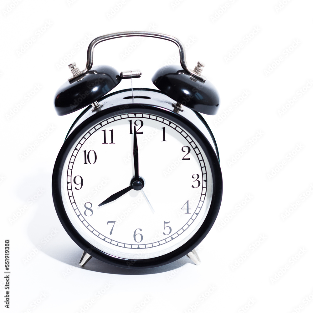 Old style alarm clock isolated on white Old style alarm clock isolated on white