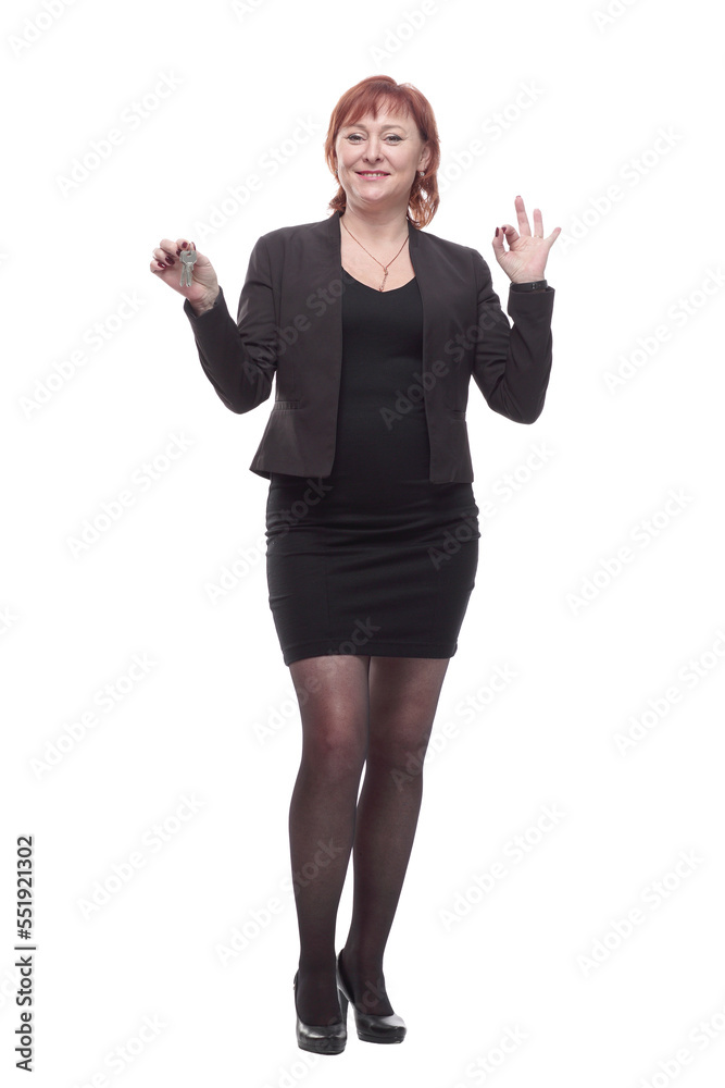 in full growth. smiling business woman with keys in hand .