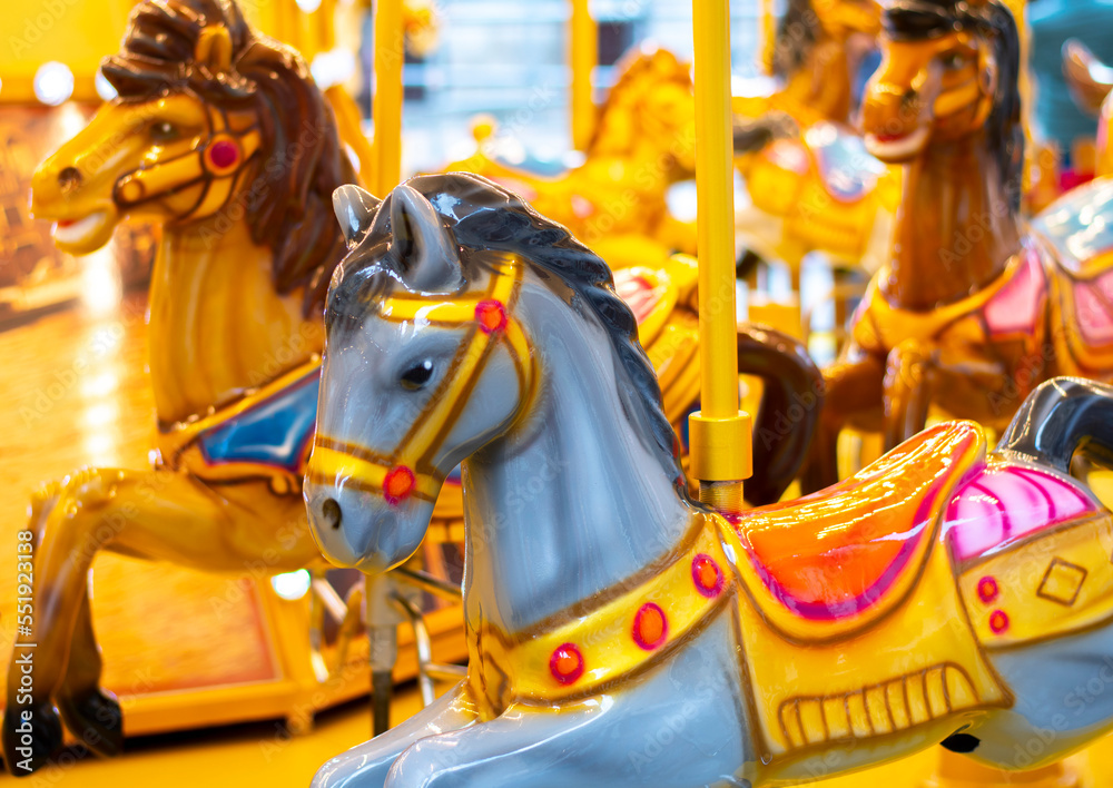 merry go round carousel. Horses in a colourful carousel with lights