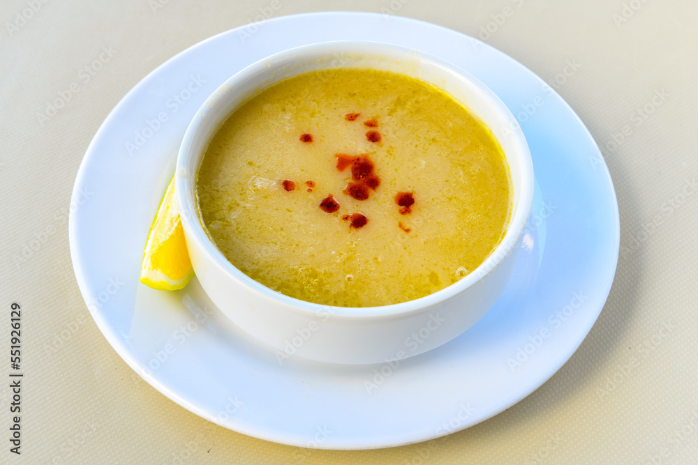 Lentil ( mercimek ) soup with melted butter and red pepper sauce. Mercimek corbasi Lentil ( mercimek ) soup with melted butter and red pepper sauce. Mercimek corbasi