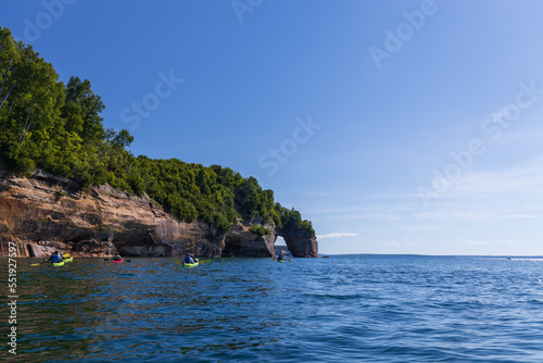 Boats and kayakers at Lover's Leap rock arch in Lake Superior at Pictured Rocks National Lakeshore, Upper Peninsula, Michigan, USA