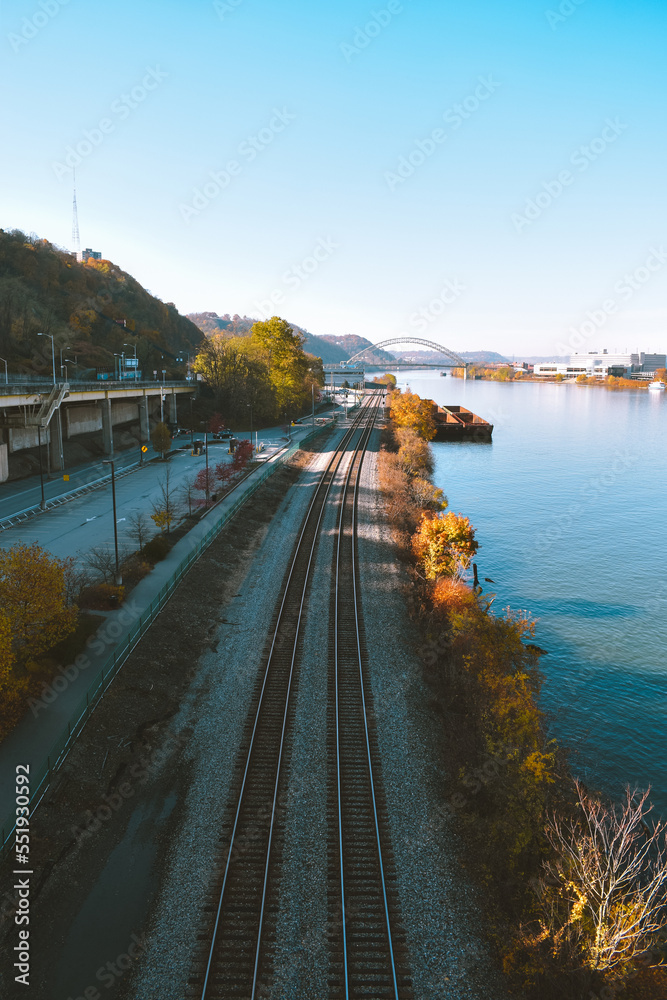Railway along the Monongahela River and Ohio River in Pittsburgh, Pennsylvania on a clear day