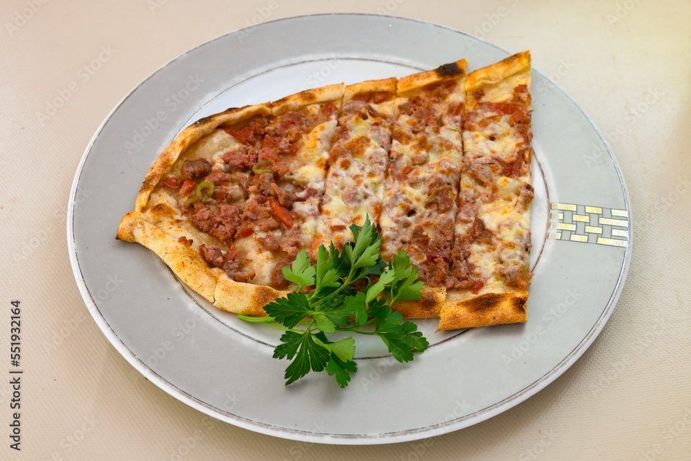 Kiymali pide. Turkish pide with minced meat. Turkish pizza mince pita Pide on white background. Etli ekmek. Kusbasili pide. Kiymali pide. Turkish pide with minced meat. Turkish pizza mince pita Pide on white background. Etli ekmek. Kusbasili pide.