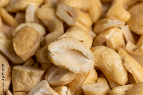 scattered pile of cashew nuts