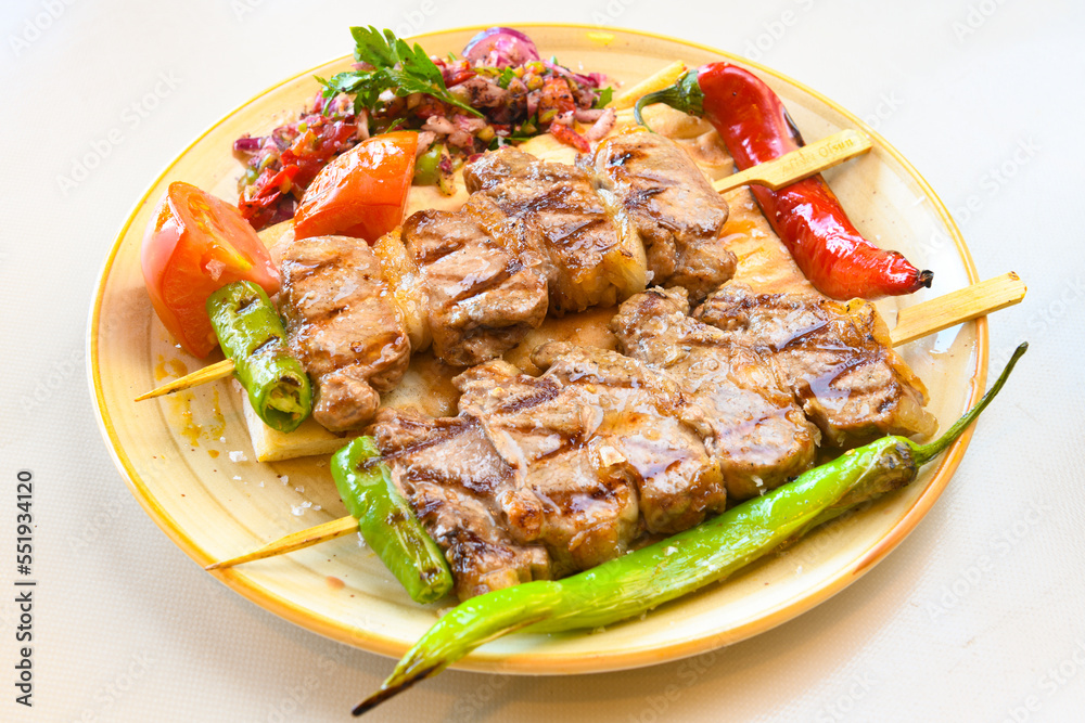 Beef steak grill with rice pilaf, fried potatoes, grilled pepper and tomatoes.Mix Platter with Beef rips, Cutlets, Potatoes and Sauces. Beef steak grill with rice pilaf, fried potatoes, grilled pepper and tomatoes.Mix Platter with Beef rips, Cutlets, Potatoes and Sauces.