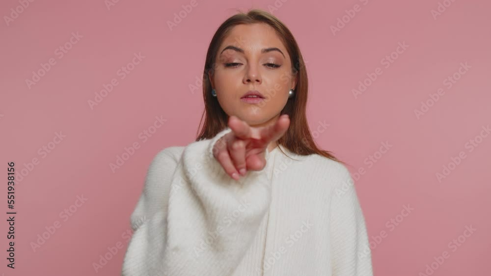 I am watching you. Caucasian woman in white sweater pointing at her eyes and camera, show I am watching you gesture, spying on someone. Young adult girl isolated alone on pink studio wall background I am watching you. Caucasian woman in white sweater pointing at her eyes and camera, show I am watching you gesture, spying on someone. Young adult girl isolated alone on pink studio wall background