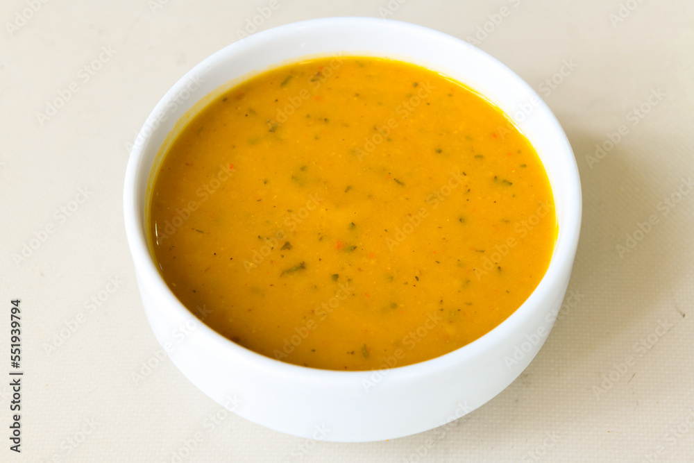 Lentil ( mercimek ) soup with melted butter and red pepper sauce. Mercimek corbasi Lentil ( mercimek ) soup with melted butter and red pepper sauce. Mercimek corbasi