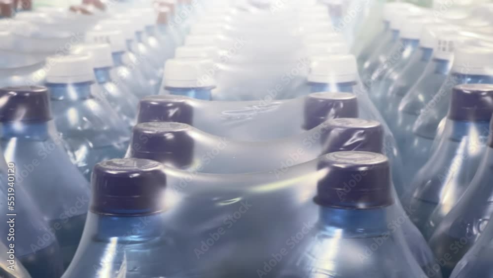 Twoliter bottles of mineral water packed in 6 bottles stand in