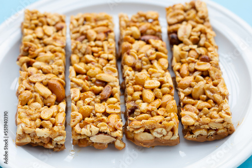 Peanuts butter chocolate bars on white