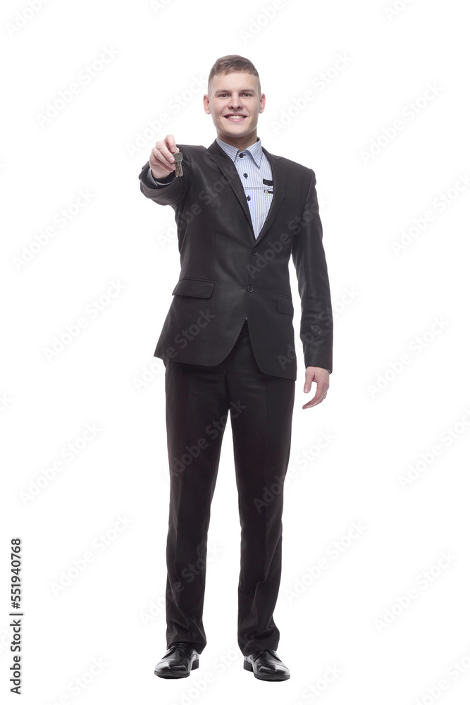 happy young businessman with keys in hand . happy young businessman with keys in hand .