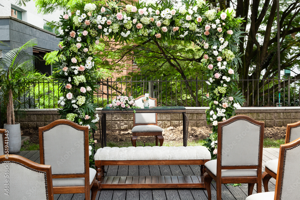 Wedding Ceremony Arch, An Altar Decorated With Flowers On The Lawn Wedding Ceremony Arch, An Altar Decorated With Flowers On The Lawn