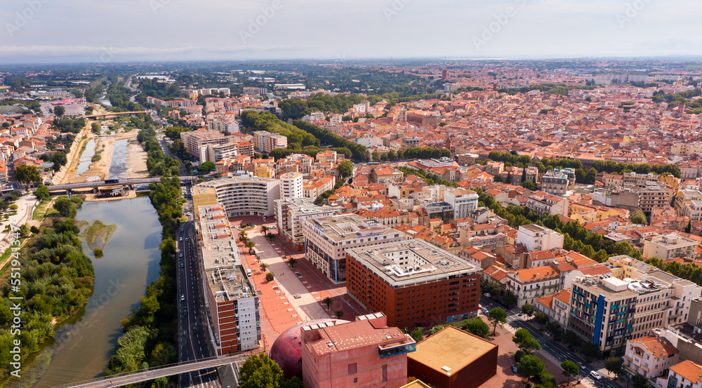 Bird's eye view of Perpignan, France. Residential buildings and Tet River visible from above.