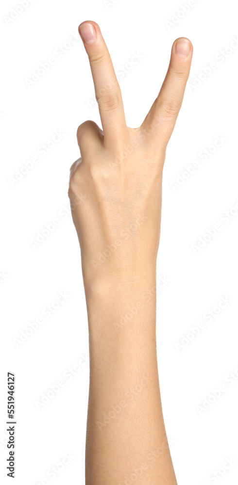 Woman showing peace gesture on white background, closeup of hand