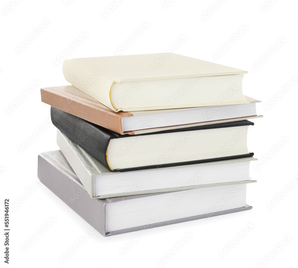 Many different books stacked on white background Many different books stacked on white background