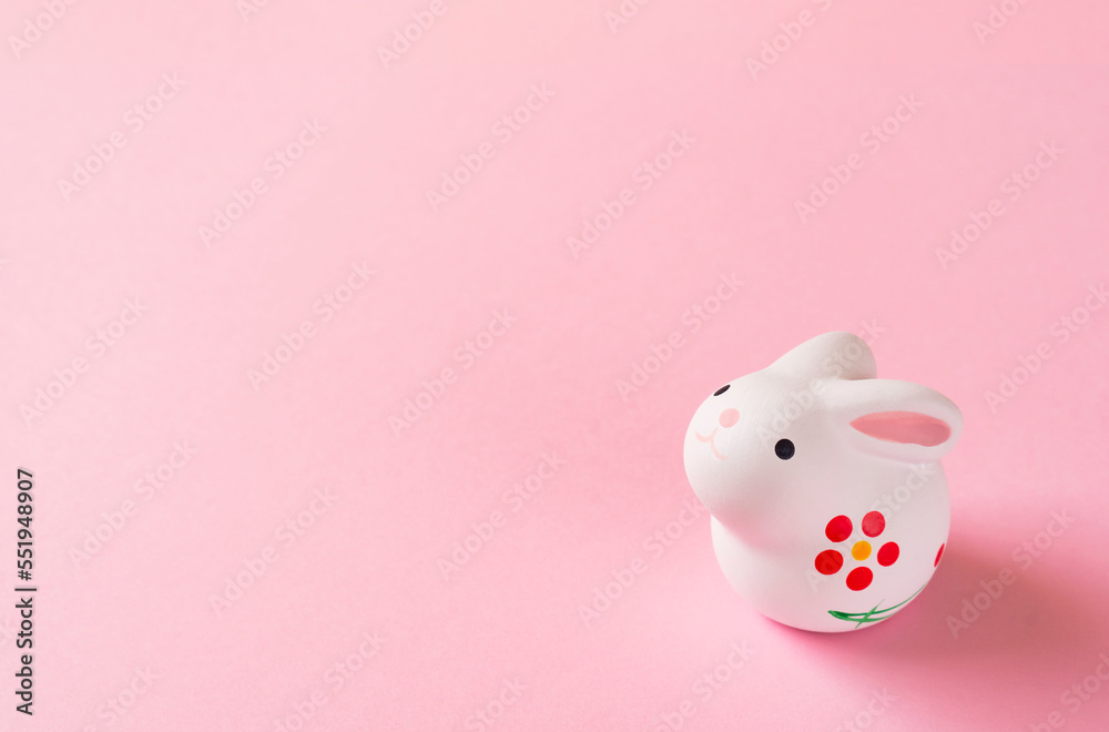 Japanese New Year's card material. zodiac rabbit. Rabbit on pink background. simple version. 日本の正月素材。干支のウサギ。ピンク背景上のウサギ。シンプルバージョン Japanese New Year's card material. zodiac rabbit. Rabbit on pink background. simple version. 日本の正月素材。干支のウサギ。ピンク背景上のウサギ。シンプルバージョン