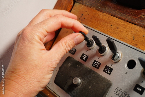 Buttons in control center control boat and light button switch. Boats panel electric control save on consumption.