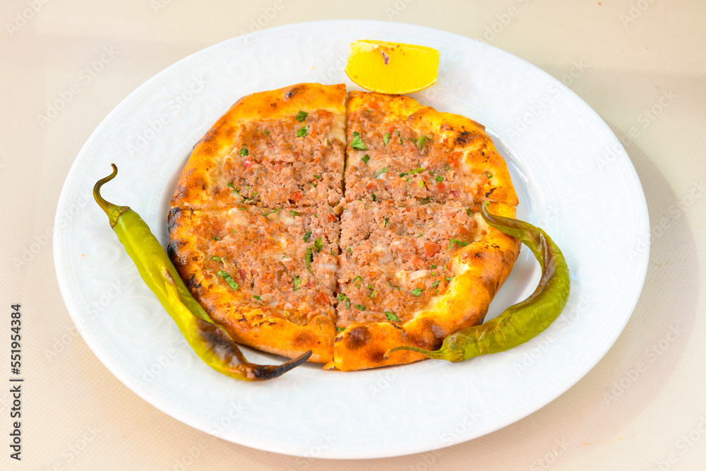 Kiymali pide. Turkish pide with minced meat. Turkish pizza mince pita Pide on white background. Etli ekmek. Kusbasili pide.