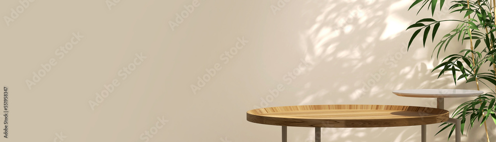 Two layer wooden round side table with Chinese bamboo plant, beautiful sun light and leaf shadow on beige wall for luxury beauty, organic, health, cosmetic, jewelry fashion product display background Two layer wooden round side table with Chinese bamboo plant, beautiful sun light and leaf shadow on beige wall for luxury beauty, organic, health, cosmetic, jewelry fashion product display background