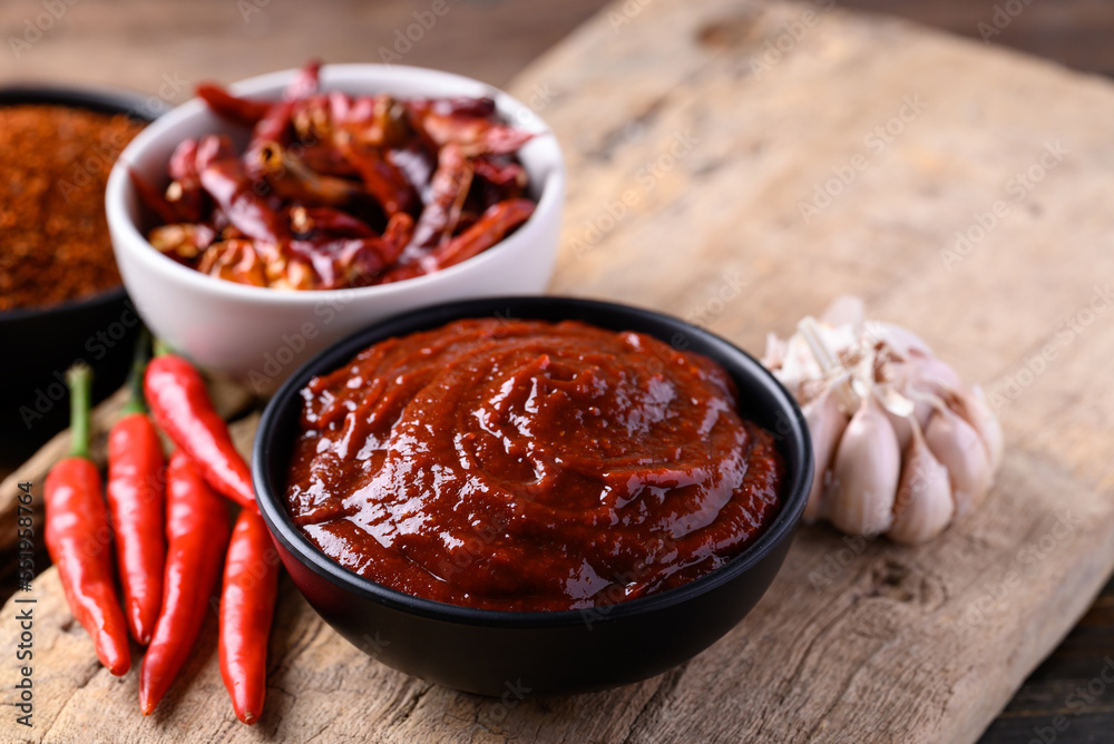 Gochujang (red chili paste), spicy and sweet fermented condiment in Korean food Gochujang (red chili paste), spicy and sweet fermented condiment in Korean food