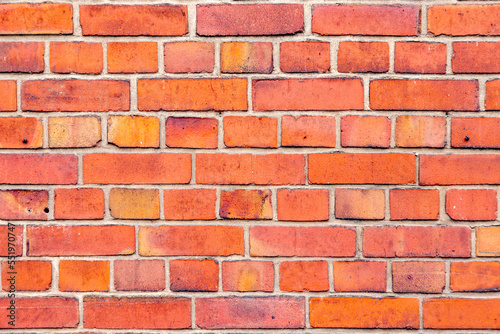 pattern of old house wall with red bricks