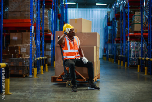 Bankruptcy or Depressed Industrial African American workers in warehouse factory. import export shipping logistics industrial transportation concept