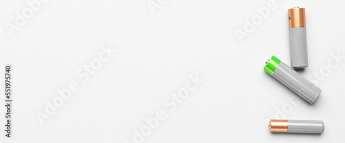 Alkaline batteries on white background with space for text