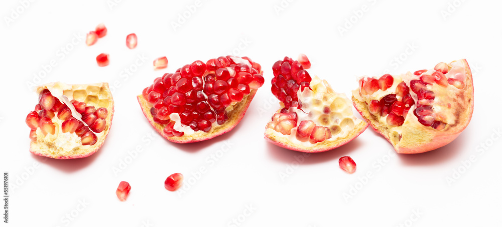 Juicy pomegranate berries isolated on white background. Juicy pomegranate berries isolated on white background.