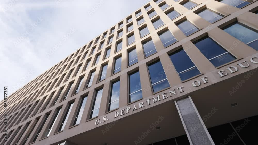 The United States Department of Education Headquarters (Lyndon Baines Johnson Building) in downtown Washington, DC. Low-angle panning shot of the signage from the C Street SW side of the building.