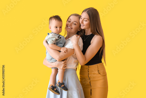Happy lesbian couple with t...