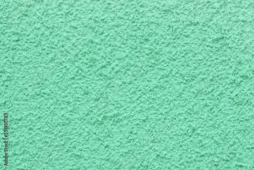 Texture of mint fluffy fabric as background